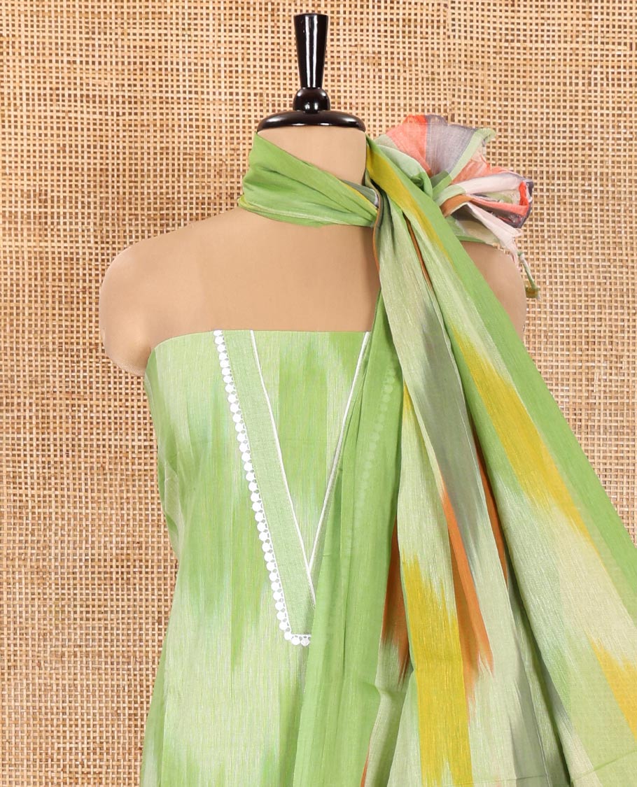 Green Material Chudidhar Set Featuring Delicately Ikkat Woven Handloom Cotton Top, Plain Cotton Bottom, and Handloom Cotton Ikkat Textured Dupatta