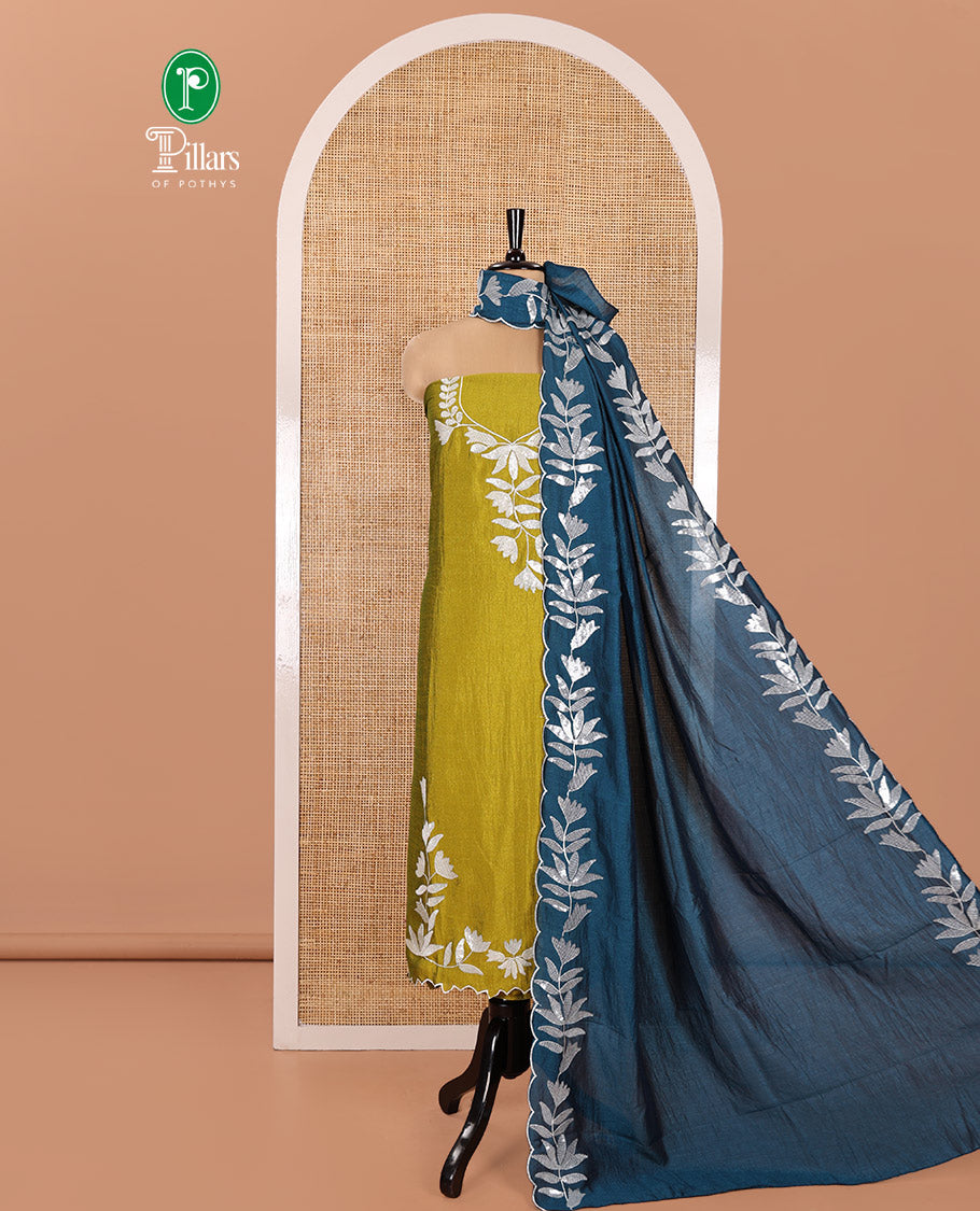 Liril Green Material Churidar Set, Detailed with Floral Motifs Sequins-Thread Embroidered on Its Vichitra Silk Top, Comes with a Contrast Santoon Bottom, and Paired with a Vichitra Silk Floral Embroidered Scallop Dupatta