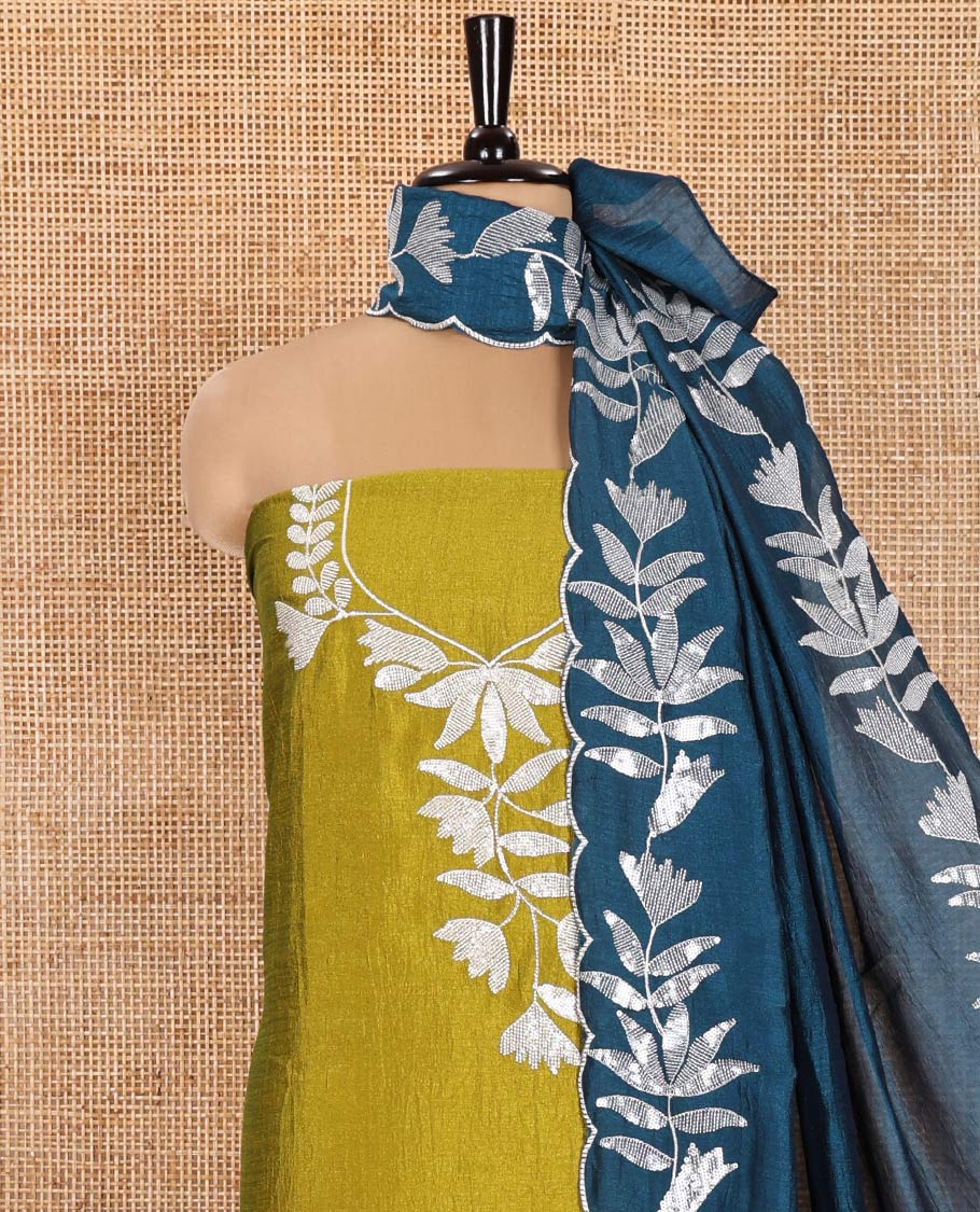 Liril Green Material Churidar Set, Detailed with Floral Motifs Sequins-Thread Embroidered on Its Vichitra Silk Top, Comes with a Contrast Santoon Bottom, and Paired with a Vichitra Silk Floral Embroidered Scallop Dupatta