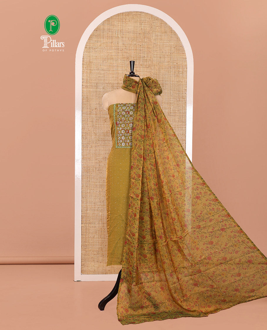 Green Material Churidar Set, Gleamed Up with Stone Work and Floral Print on Nc Moss Organza Top, Comes with a Plain Santoon Bottom, and Is Paired with a Nc Moss Dupatta of Floral Print and Stone Work