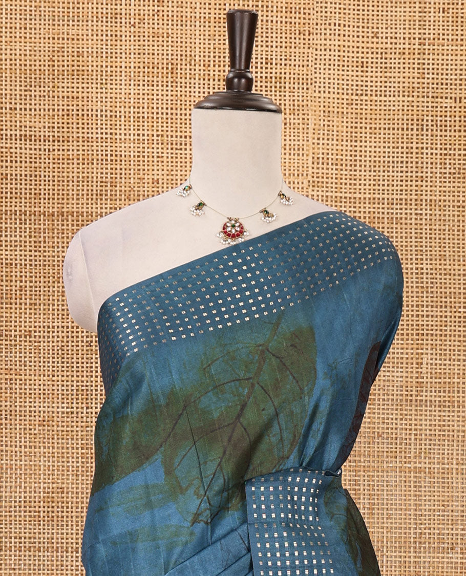 Peacock green leaf motifs eco-digital printed fancy tussar saree, zari border, pallu of dobby-style buttas & matching zari design blouse