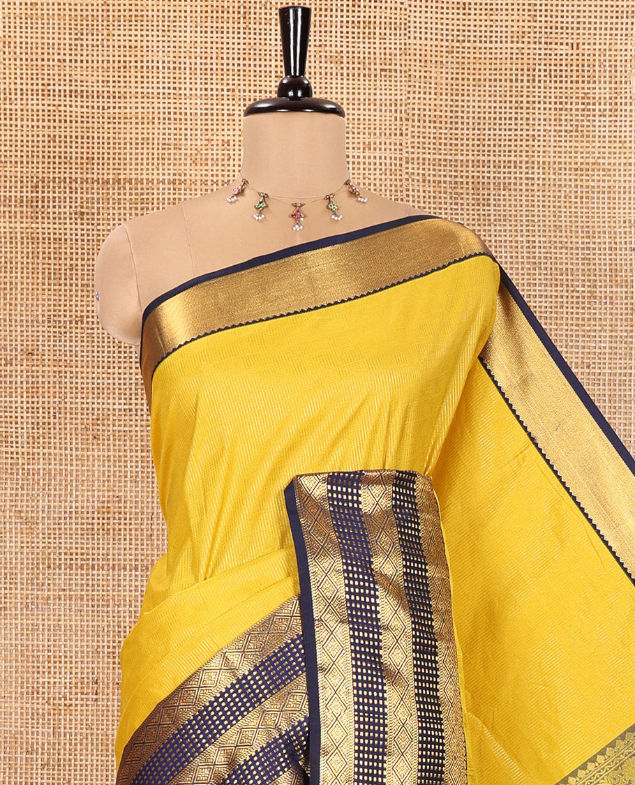 Yellow Kanchipuram Budget Silk Saree, Subtly Sparkled with Geometric Jacquard All Over Its Body, Complemented by a Contrast Traditional Zari Border of Diamond Designs, Grand Jaal Pallu, and Paired with a Contrast Blouse
