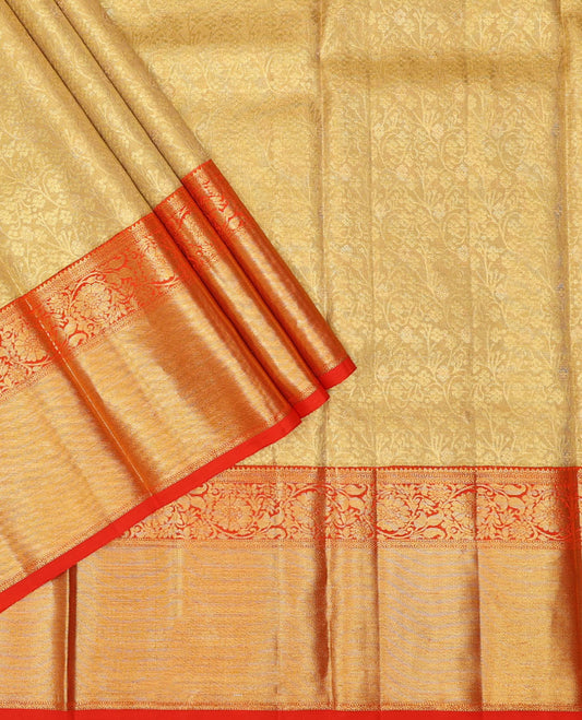 Gold pure-silk half saree, jacquard skirt, contrast border & blouse of rekku,muthu,neli & kodi visiry motifs & intricate dhavani