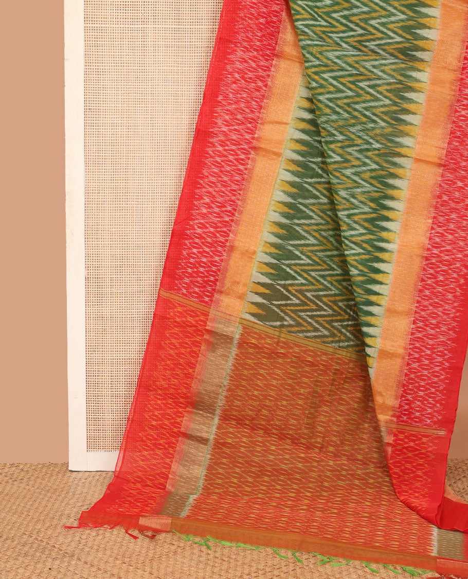 Green ikkat chevron design silk cotton saree, contrast zari bavanji border of ikkat jaal design, and pallu of jaal design