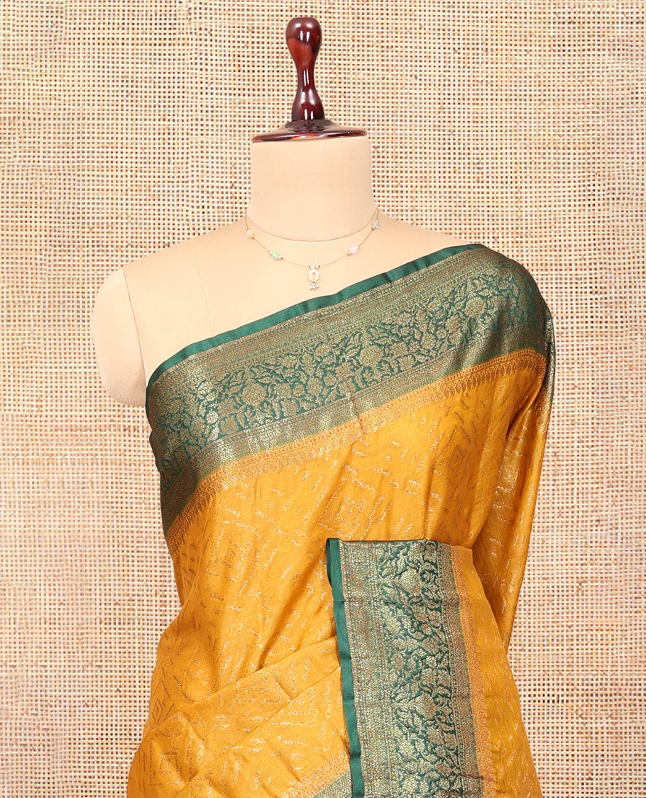 Mustard Tussar Silk Saree Features Zari Designs, Complemented by a Contrast Floral Zari Border, Intricately Designed Pallu, and a Contrast Blouse