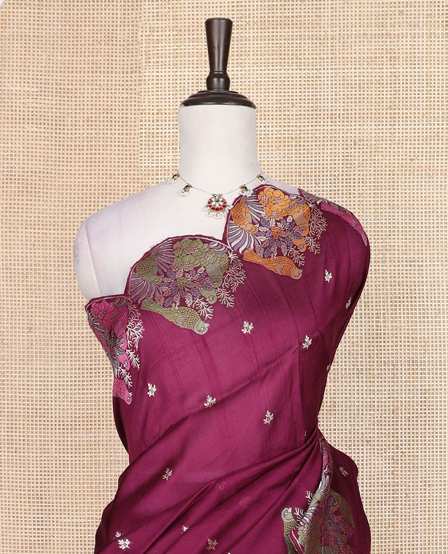 Wine Matka silk saree features rudraksham motifs, scallop floral motifs and bird embossed thread embroidery border