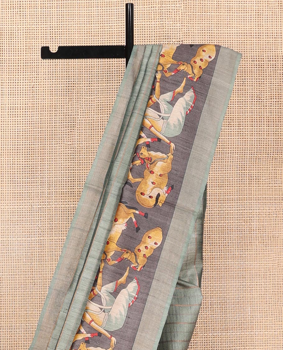 Green Tussar Silk Saree, Subtly Sparkled with Stripes, Complemented by a Contrast Pichwai Cow Border, Printed Pallu, and a Matching Blouse