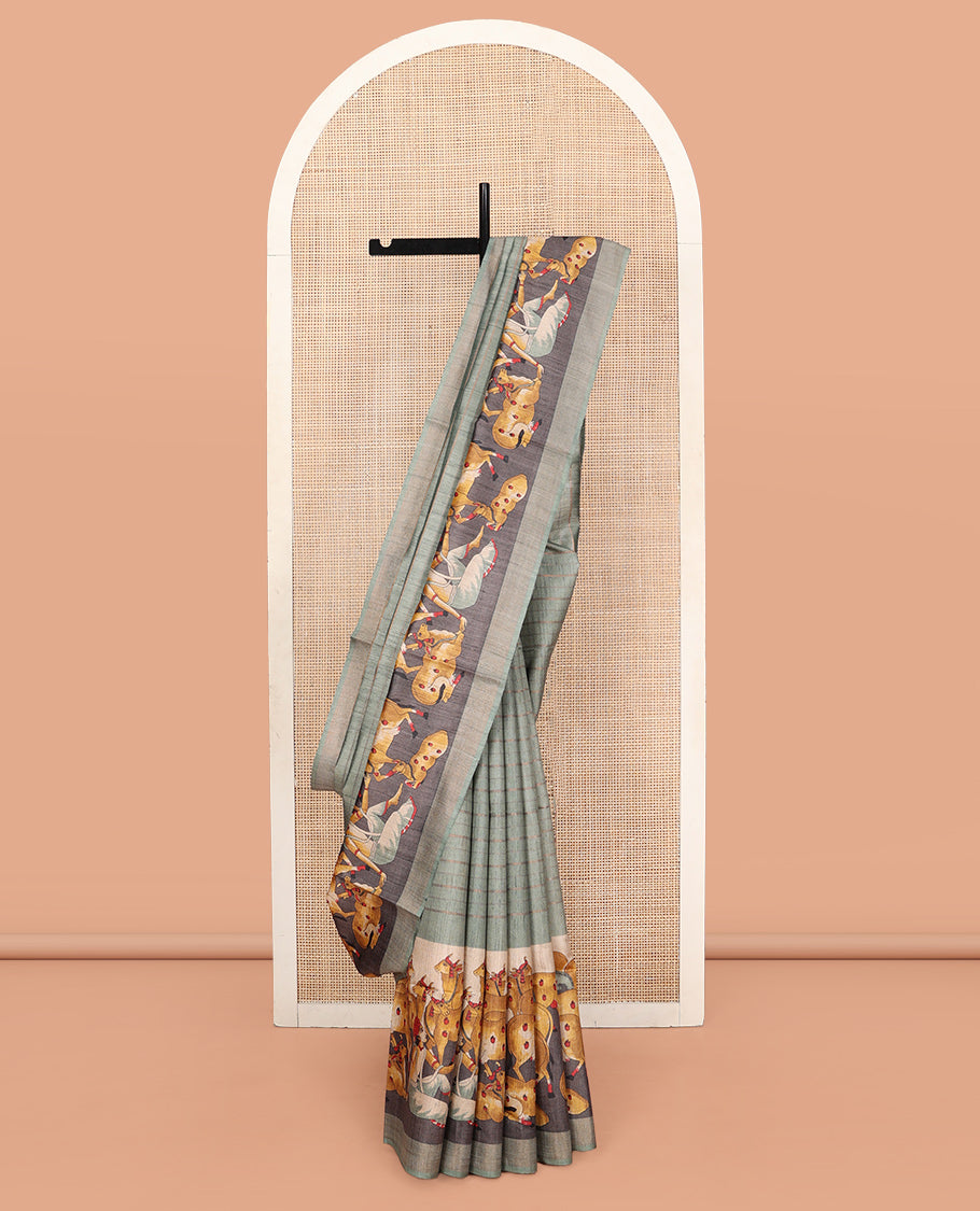 Green Tussar Silk Saree, Subtly Sparkled with Stripes, Complemented by a Contrast Pichwai Cow Border, Printed Pallu, and a Matching Blouse