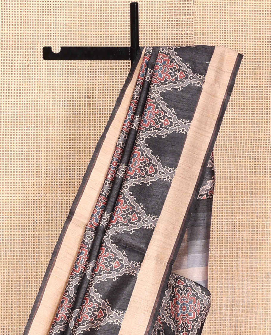 Black Tussar Silk Saree, Artfully Detailed with Ajrakh-Style Jaal Design on Its Body, a Subtle Border, Ombre-Style Striped Pallu, and Paired with a Contrast Blouse