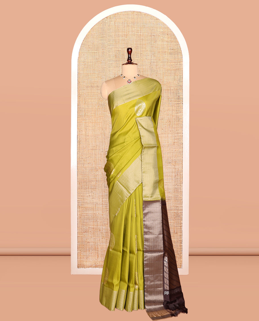 Green Semi Uppada Saree, Enriched with Zari Buttas, a Bavanji Border, Contrast Diagonal Leaf Vine Pallu, and a Contrast Blouse