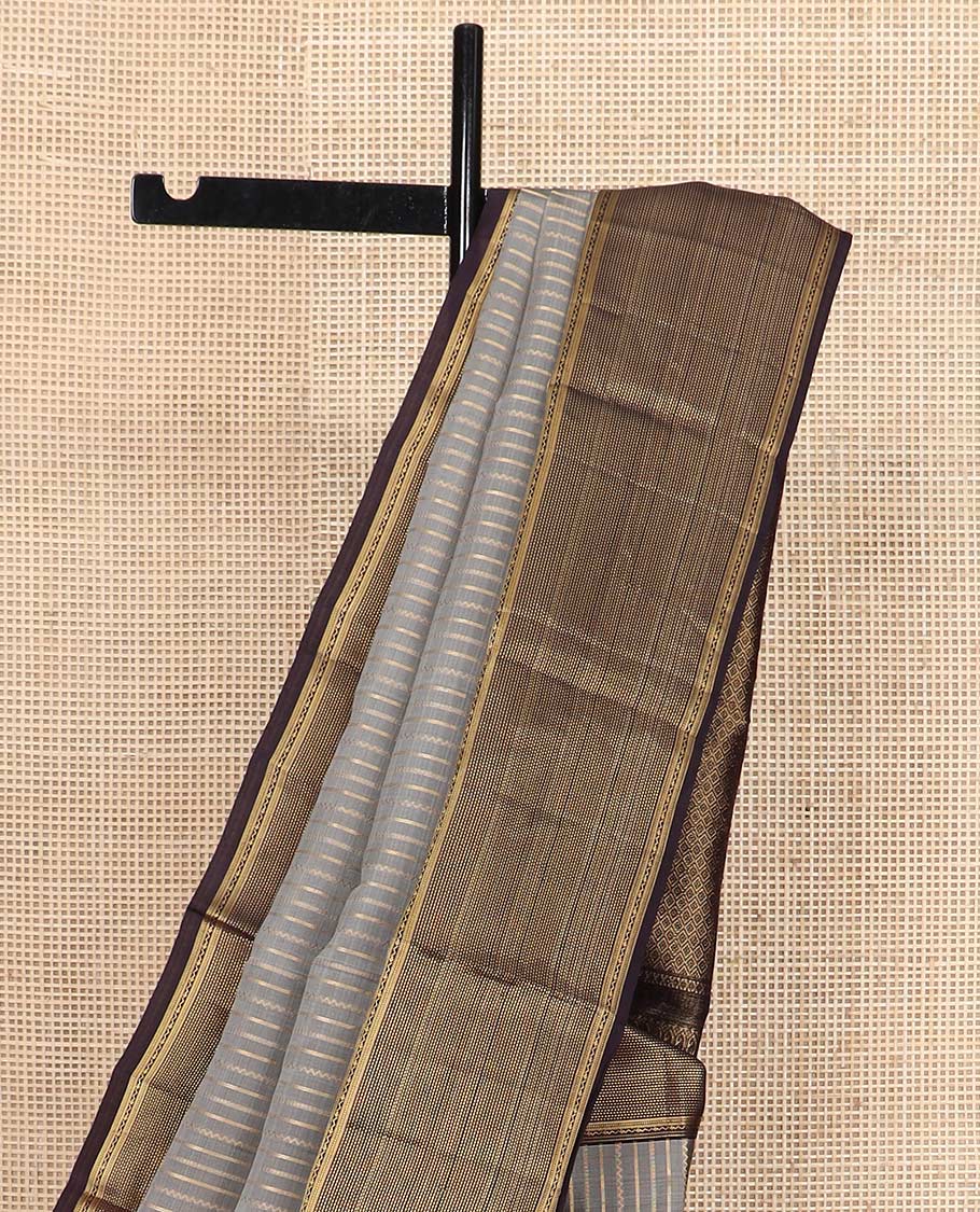 Grey zari striped Vasundhara silk mix saree, contrast zari border of muthu stripes, and zari-rich pallu