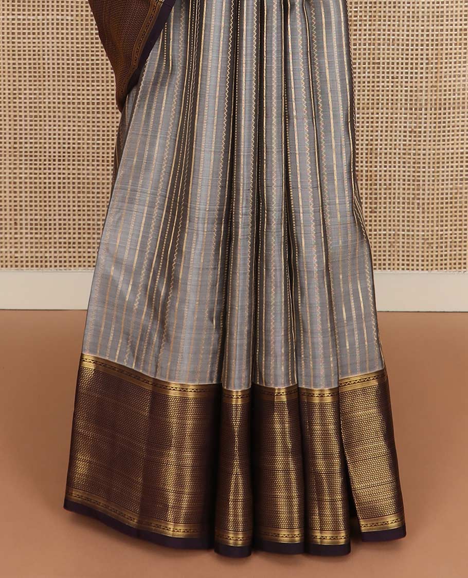 Grey zari striped Vasundhara silk mix saree, contrast zari border of muthu stripes, and zari-rich pallu