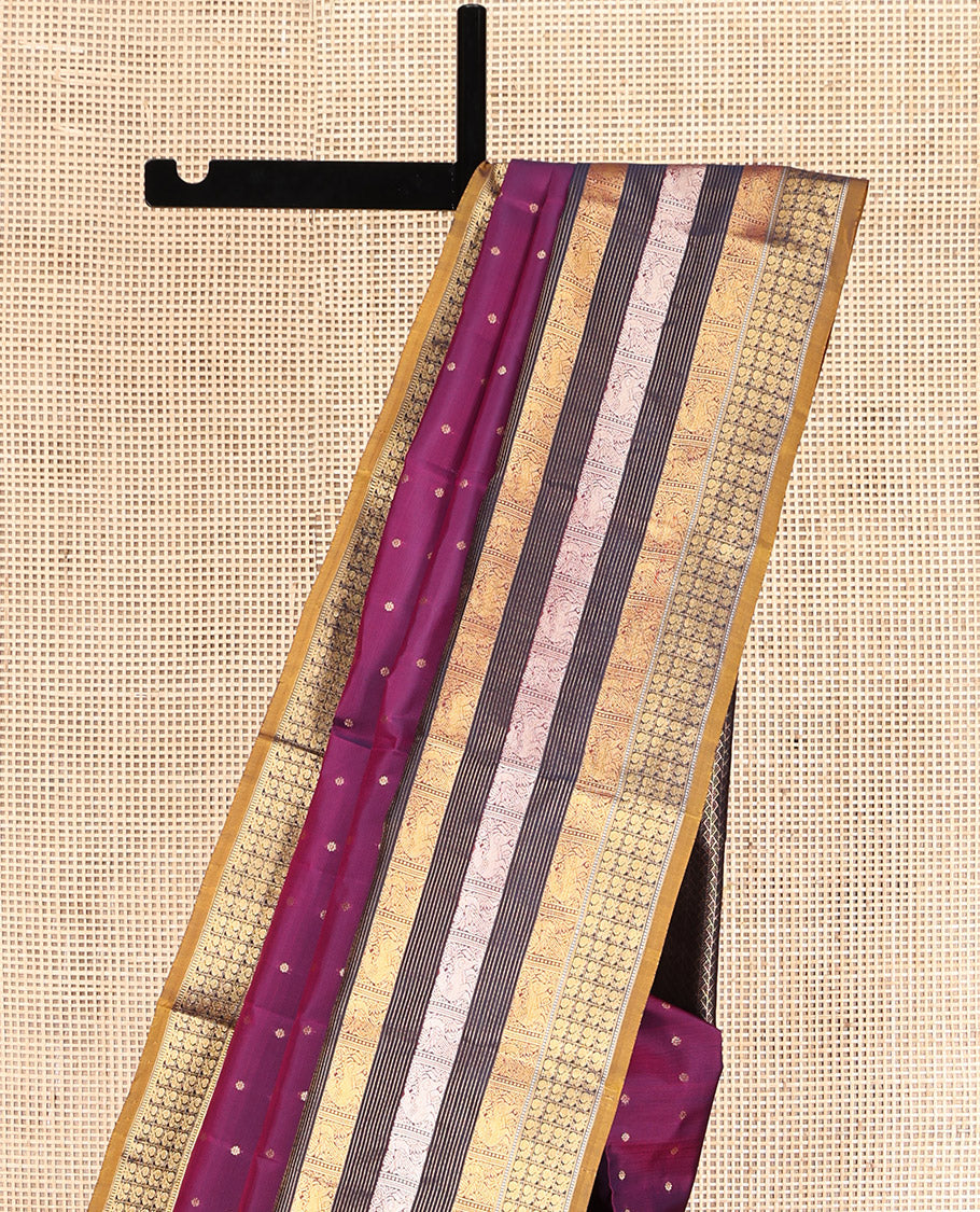 Magenta Vasundhara Lite Silk Mix Saree, Ornamented with Zari Buttas, Complemented by a Contrast Border of Yaali and Mayil Designs, Zari Design Pallu, and a Contrast Blouse