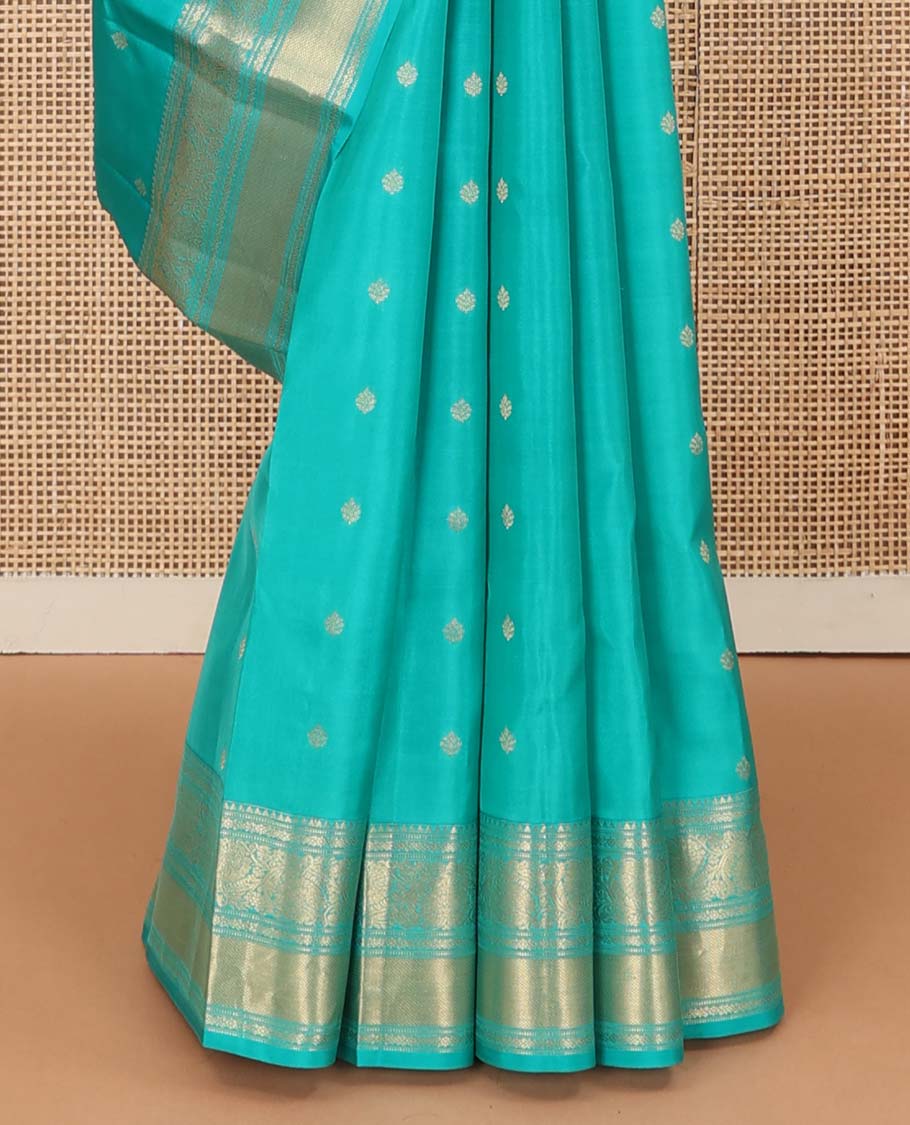 Blue zari buttas Vasundhara silk mix saree, zari border of rekku, kodi visiry, and kuyil kann designs, and jaal pallu