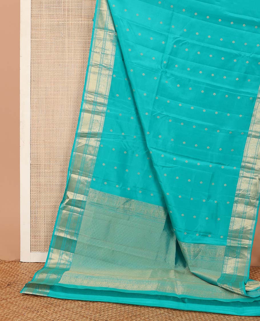 Blue zari buttas Vasundhara silk mix saree, zari border of rekku, kodi visiry, and kuyil kann designs, and jaal pallu
