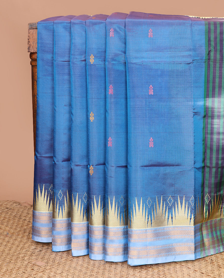Blue buttas banana pith saree, contrast temple traditional zari border, and contrast striped pallu