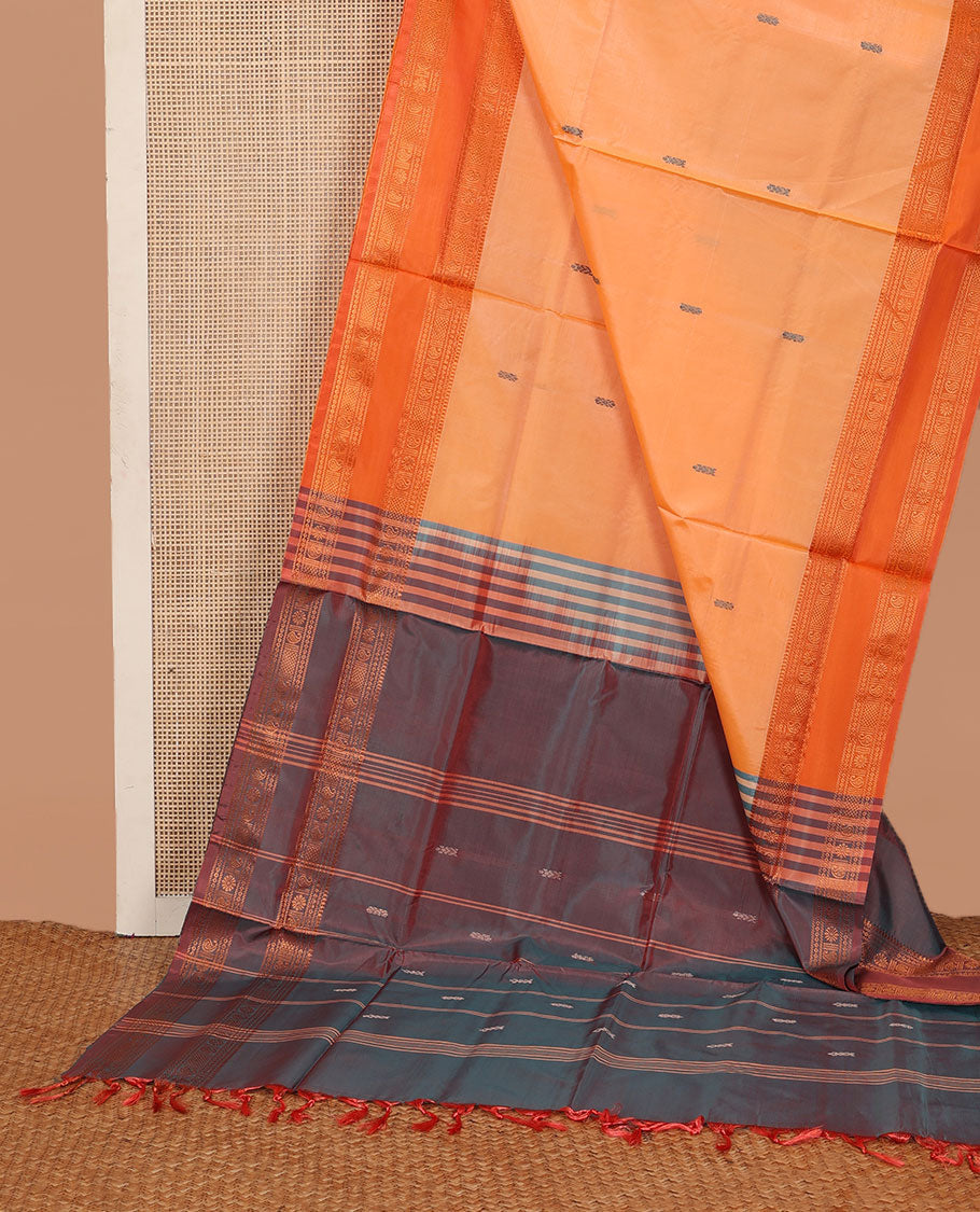 Orange thread buttas banana pith saree, contrast traditional zari border, and contrast pallu of stripes, and buttas