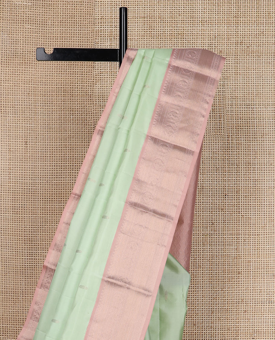 Green zari buttas silk saree, contrast border of thilakam,banaras, manga & chakram designs & pallu of jaal design