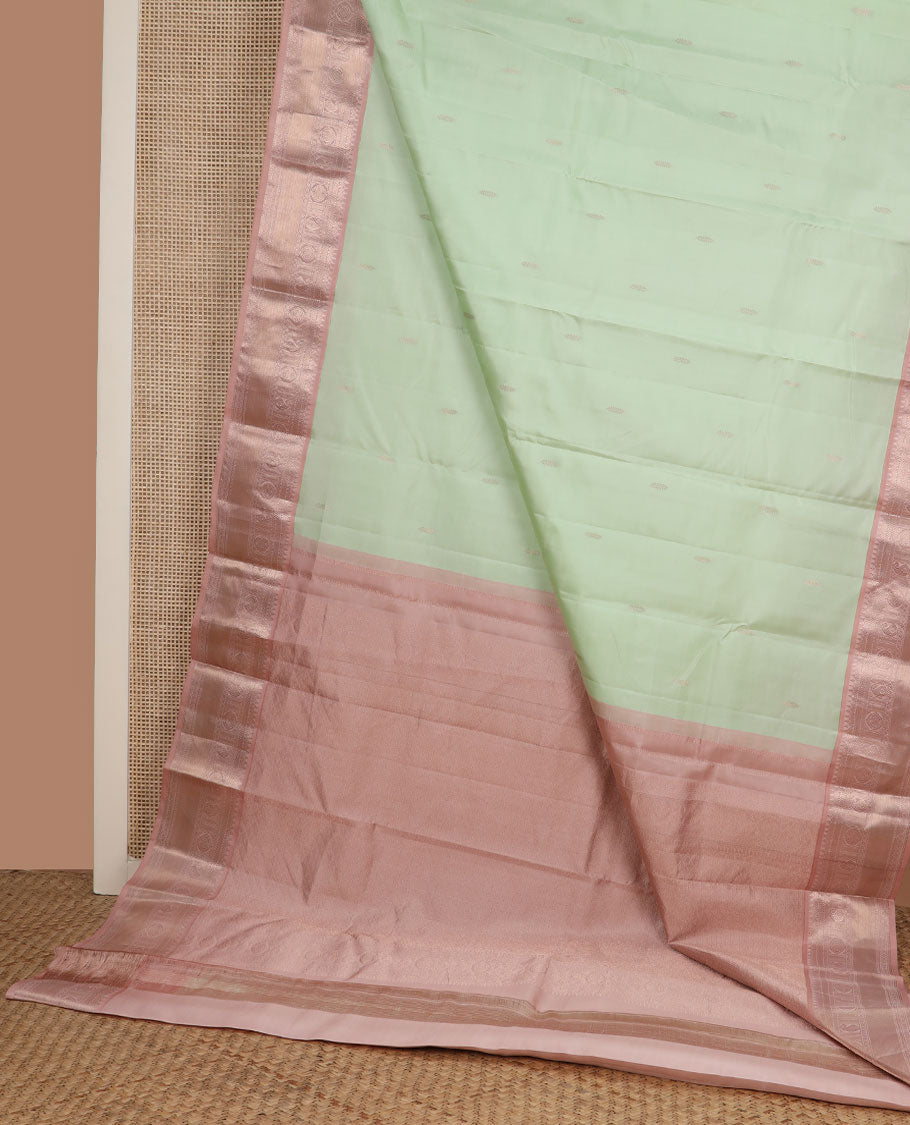 Green zari buttas silk saree, contrast border of thilakam,banaras, manga & chakram designs & pallu of jaal design