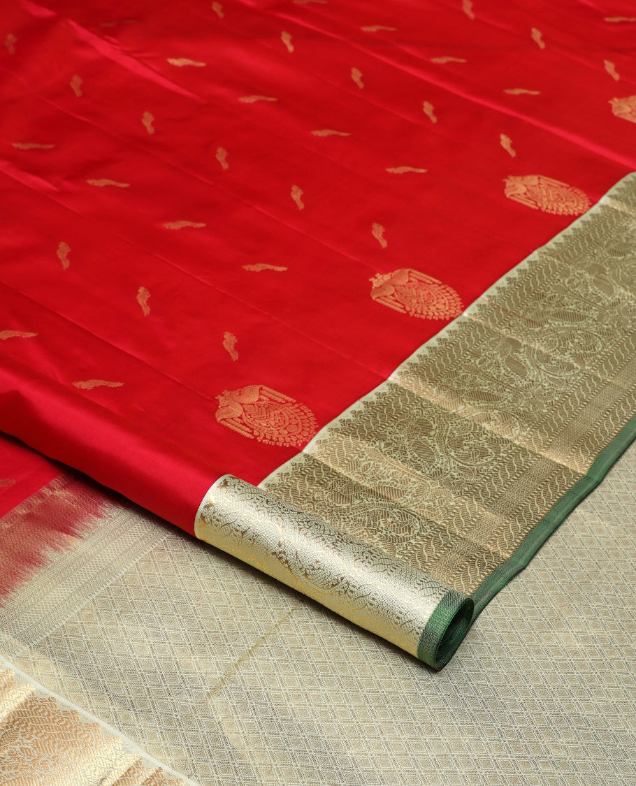 Red bird buttas silk saree, contrast border of puli nagam, mayil, and then kuli kann and jaal pallu