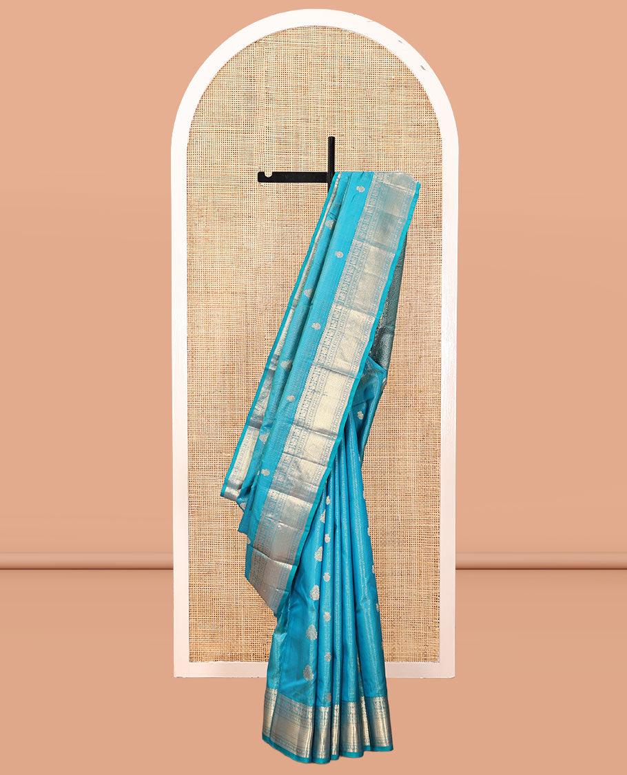 Blue Vasundhara Silk Saree, Woven with Zari Buttas and Vaira Oosi Stripes, a Traditional Zari Border, Grand Pallu, and a Matching Blouse