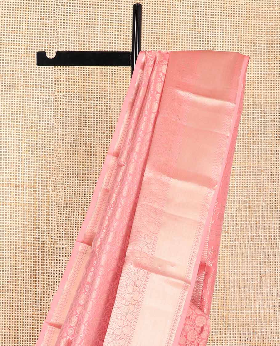 Peach floral jacqaurd kancheepuram silk saree with self intricate zari design border & floral design pallu