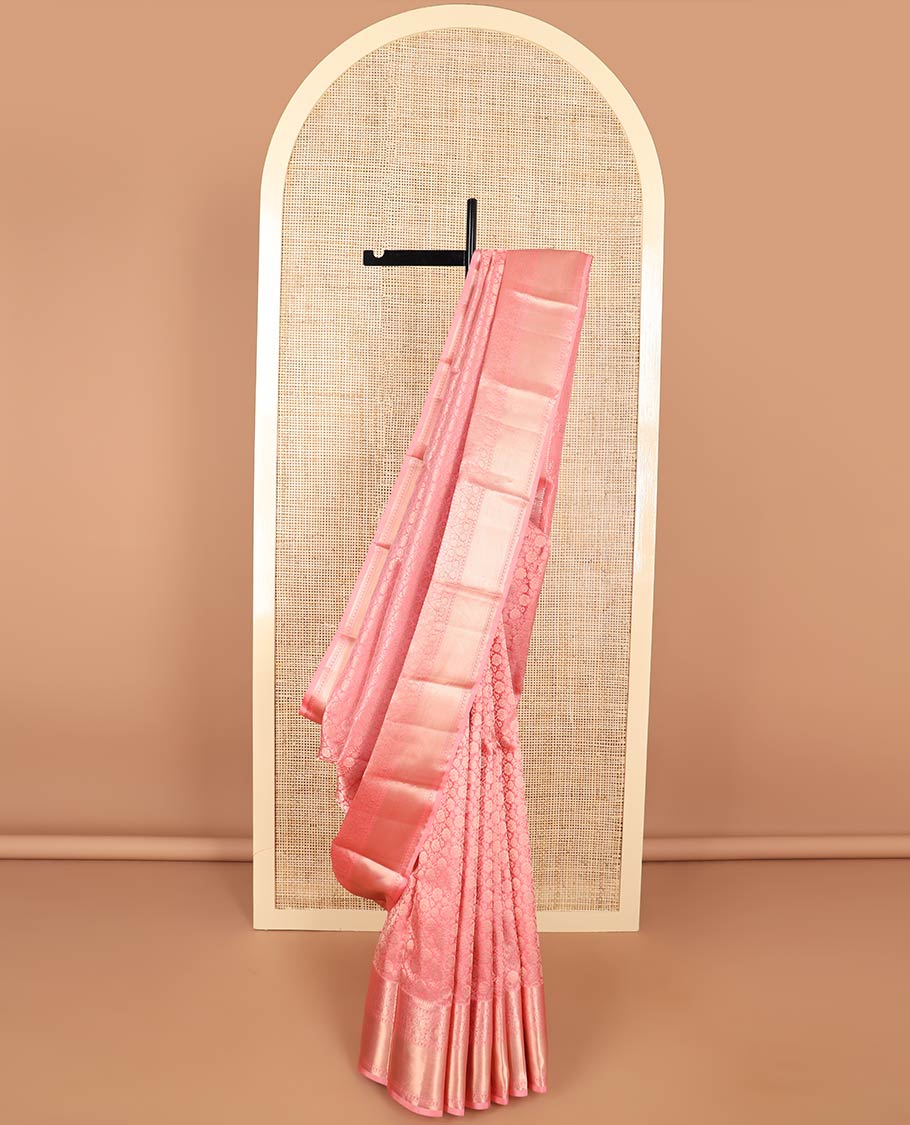 Peach floral jacqaurd kancheepuram silk saree with self intricate zari design border & floral design pallu