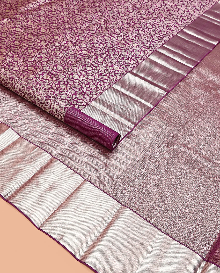 Purple jacquard kanchipuram silk saree, zari border, and zari-rich pallu of vanki designs