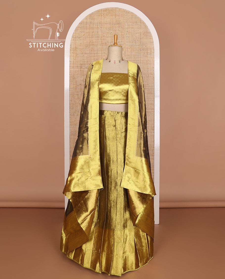 Gold color floral design tissue half saree with contrast zari design border, zari design blouse & floral design dhavani