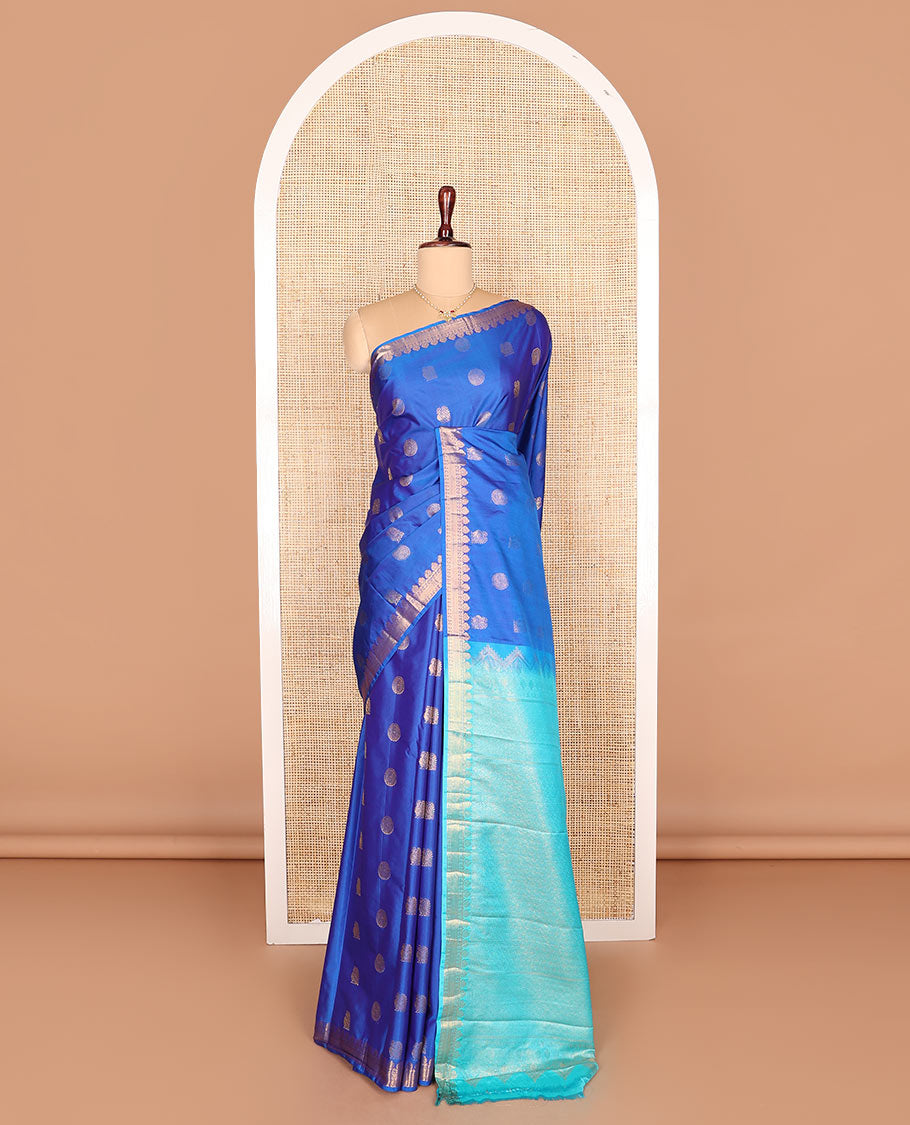 Blue peacock chakram buttas budget silk saree, traditional zari design border, and contrast ogee patterned pallu