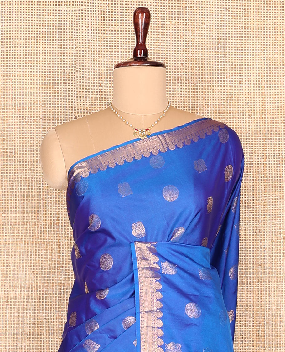 Blue peacock chakram buttas budget silk saree, traditional zari design border, and contrast ogee patterned pallu