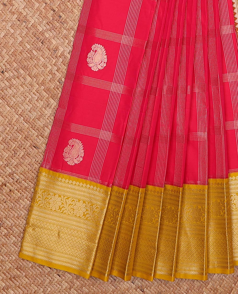 Red zari butta enclosed checked gift saree, contrast traditional zari design border, and jaal pallu