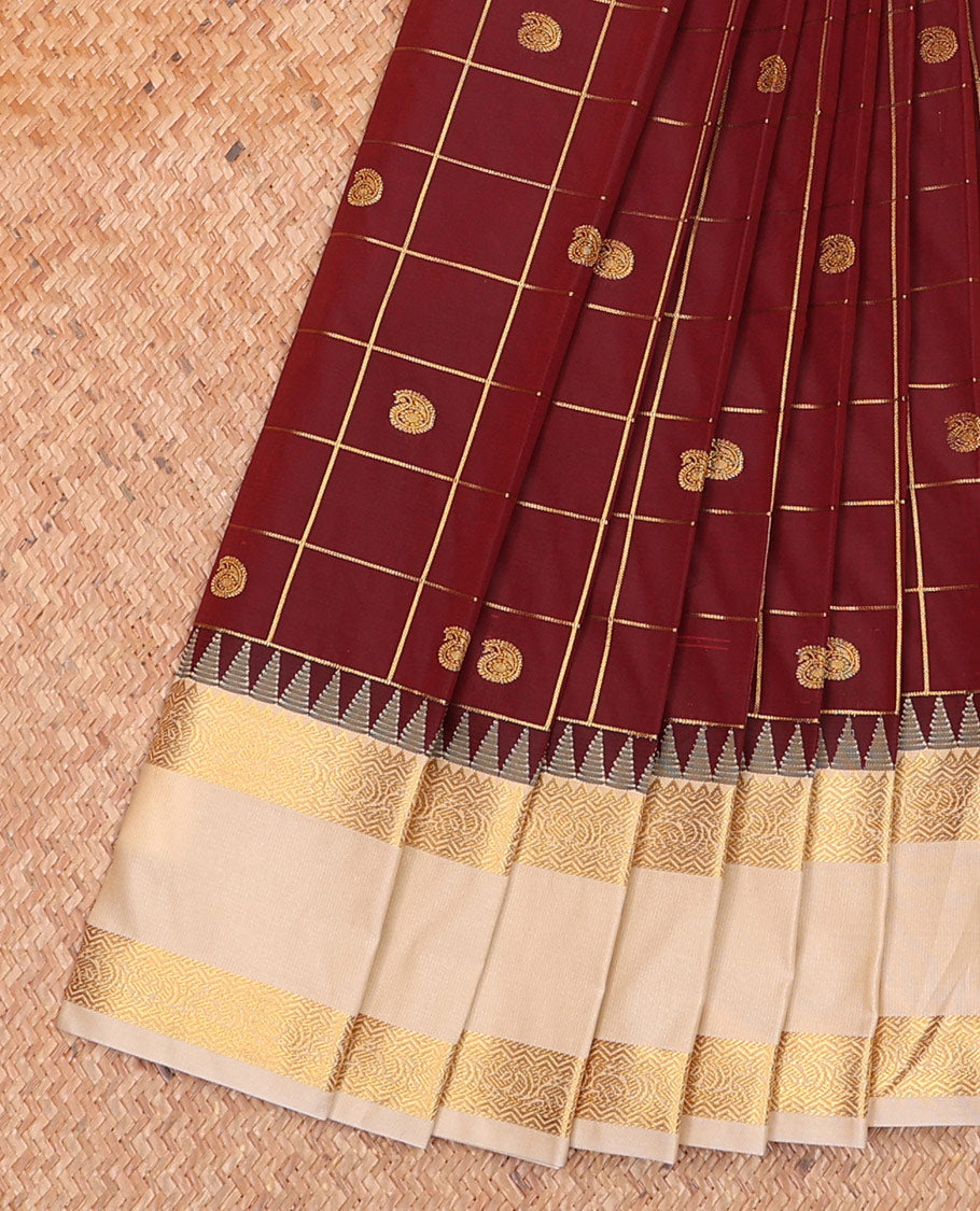 Maroon Budget Silk Saree, Subtly Enriched with Paisley Butta Enclosed Checked Designs on Its Body, Complemented by a Contrast Traditional Zari Design Rettai Pettu Border, Grand Jaal Pallu, and Paired with a Contrast Blouse