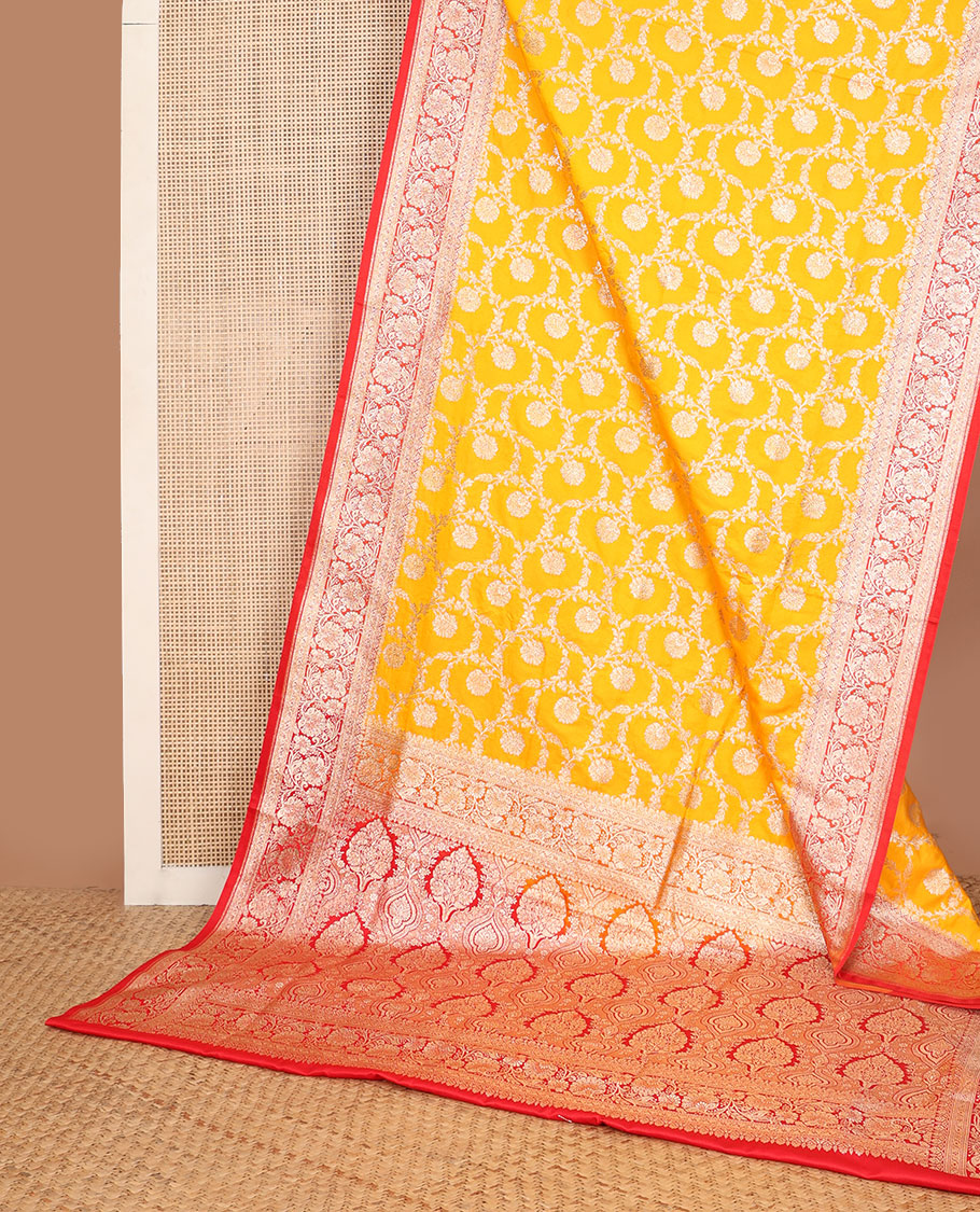 Orange floral jaal design semi banaras nylon saree with self floral zari design border & floral design pallu