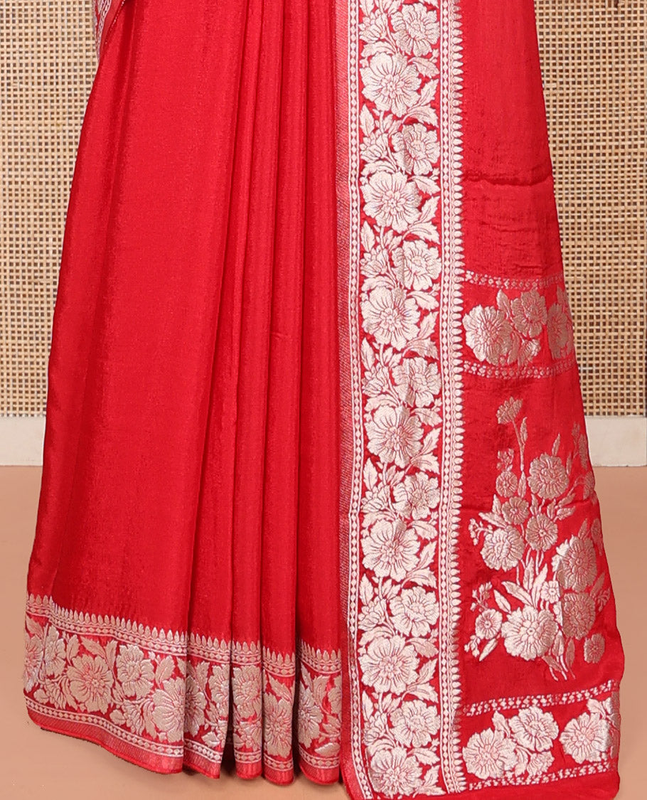 Red Plain Fancy Crepe Saree, Highlighted by a Floral Border, Pallu of Floral Designs, and a Matching Blouse