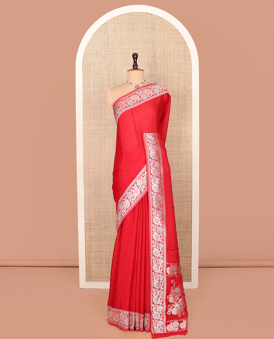 Red Plain Fancy Crepe Saree, Highlighted by a Floral Border, Pallu of Floral Designs, and a Matching Blouse