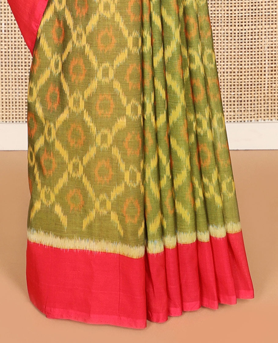 Green argyle design ikkat cotton saree with contrast border & geometric design pallu
