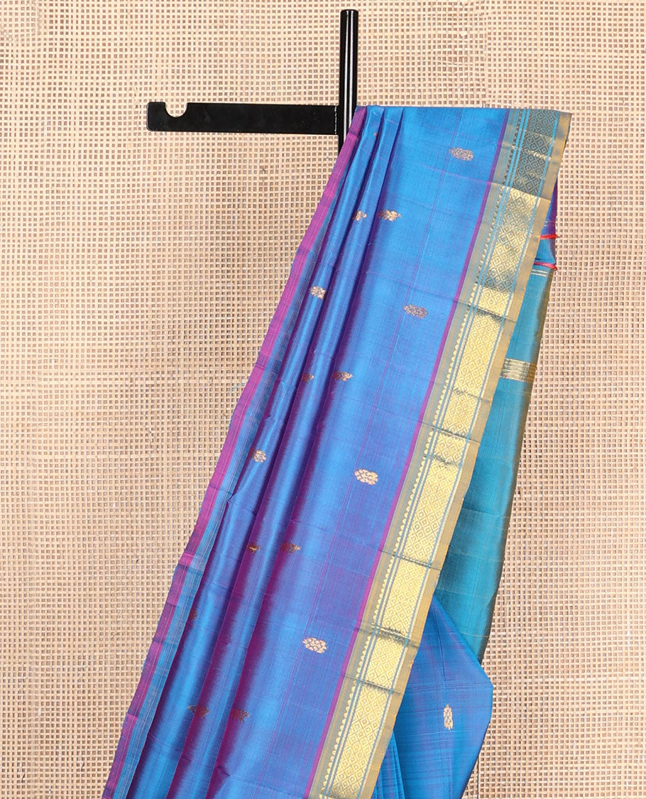 Blue zari buttas kanchipuram silksaree, contrast one-sided border of rekku,banaras & mayil kann & zari design pallu