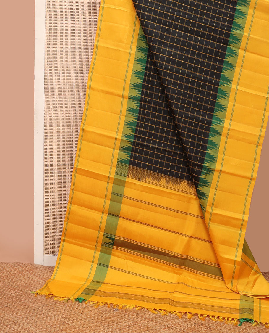 Black checked kanchipuram silksaree,contrast rettai pettu striped thazampoo rekku border & pallu of stripes & pillaiyar mokku design