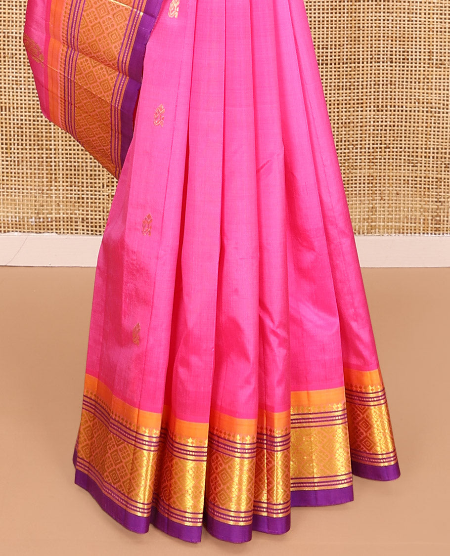 Pink Kanchipuram Silk Saree, Impeccably Styled with Zari Buttas All Over Its Body, Complemented by a Contrast One-Sided Border of Panner Sombu, Banaras, Muthu, and Jaal Designs, Pallu of Floral-Paisley Designs, and Comes Without a Blouse