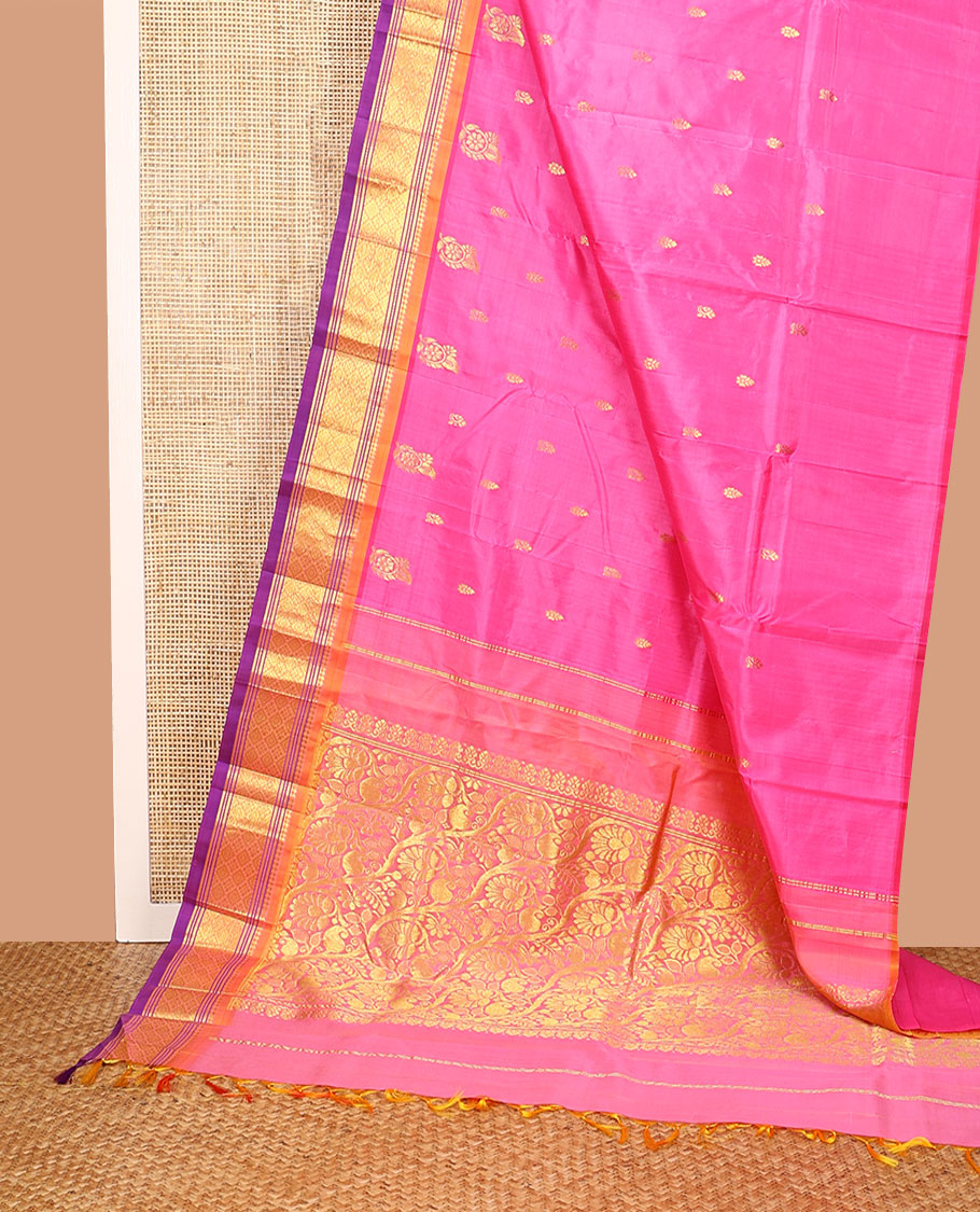 Pink Kanchipuram Silk Saree, Impeccably Styled with Zari Buttas All Over Its Body, Complemented by a Contrast One-Sided Border of Panner Sombu, Banaras, Muthu, and Jaal Designs, Pallu of Floral-Paisley Designs, and Comes Without a Blouse
