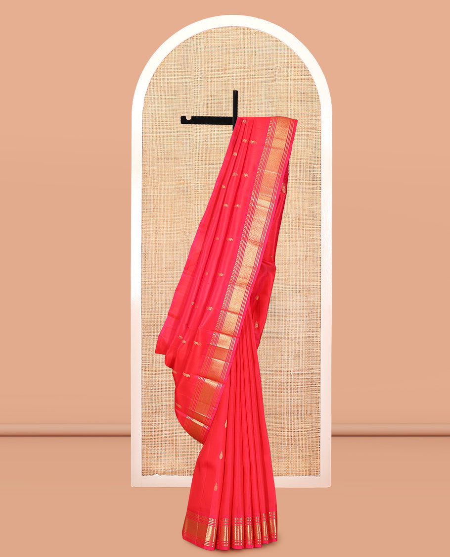 Red Kanchipuram Silk Saree, Decorated with Zari Buttas, Highlighted by a Zari Border of Panner Sombu, Banaras, Muthu, and Jaal Design, Pallu of Zari Design, and No Blouse