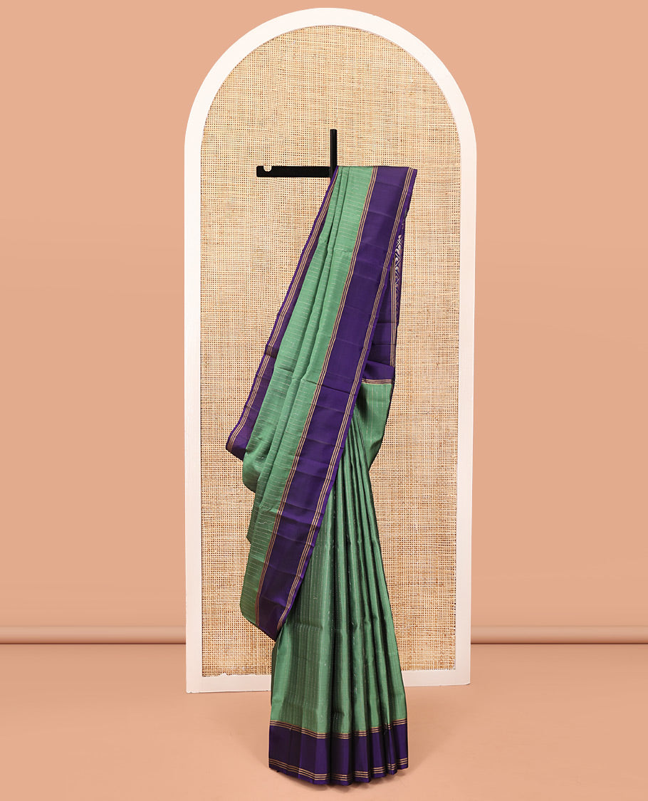 Green Mayuri Lite Silk Mix Saree, Sparsely Sparkled with Muthu Stripes on Its Body, Complemented by a Contrast Border, Jaal Pallu, and Paired with a Contrast Blouse