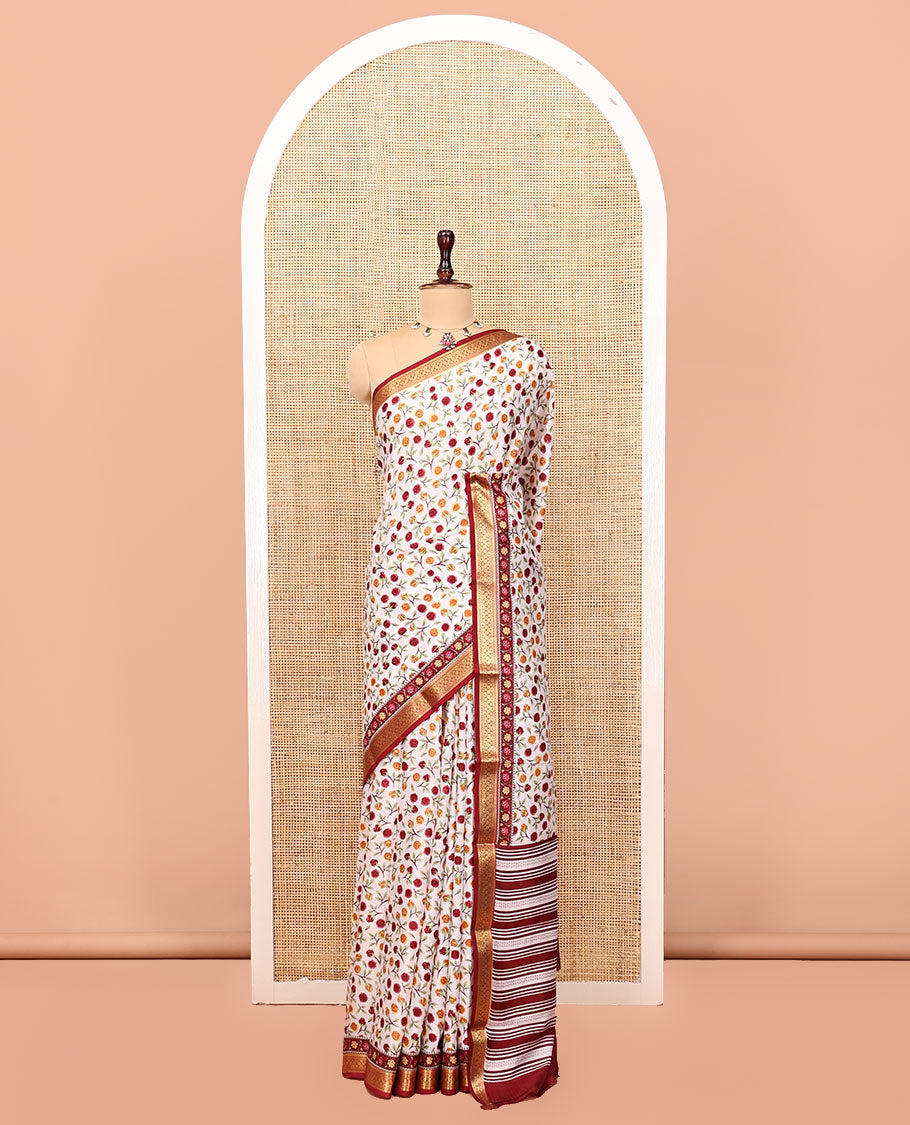 Cream Printed Silk Saree Beautified with a Floral Print, Contrast Traditional Zari Border, Striped Pallu, and Contrast Blouse