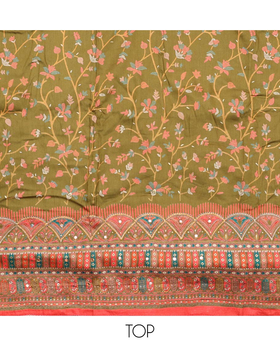 Green material churidar set, floral and kaleidoscopic geometric patterned rayon top, plain bottom, and dupatta of floral and geometric patterns