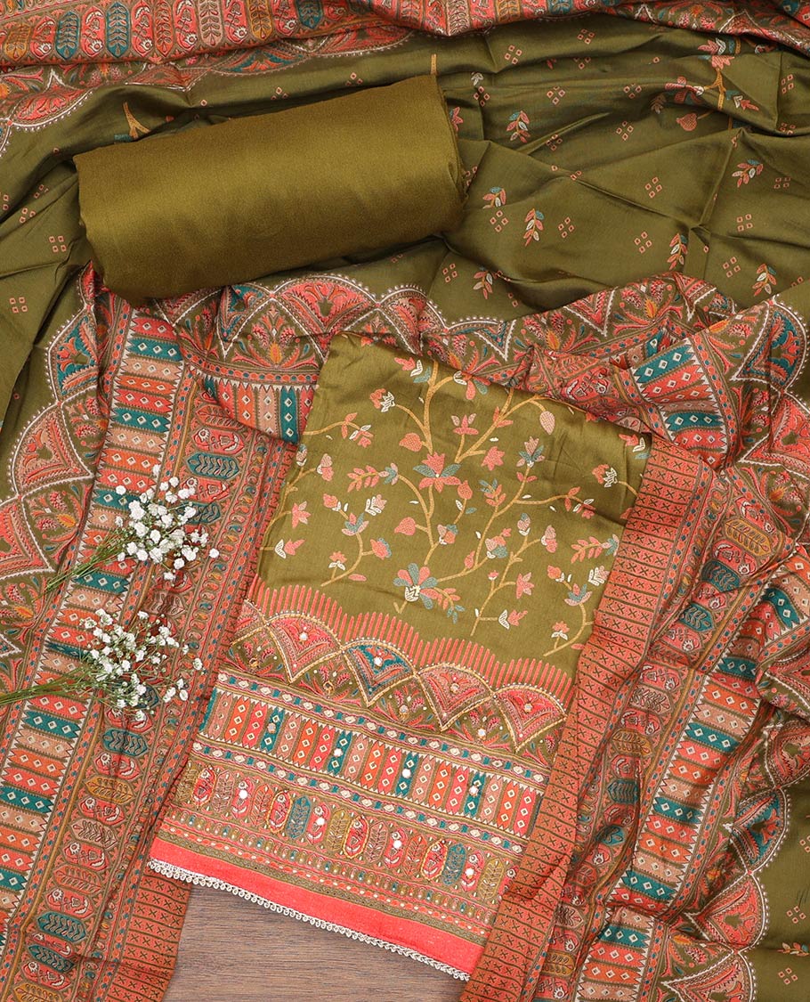 Green material churidar set, floral and kaleidoscopic geometric patterned rayon top, plain bottom, and dupatta of floral and geometric patterns