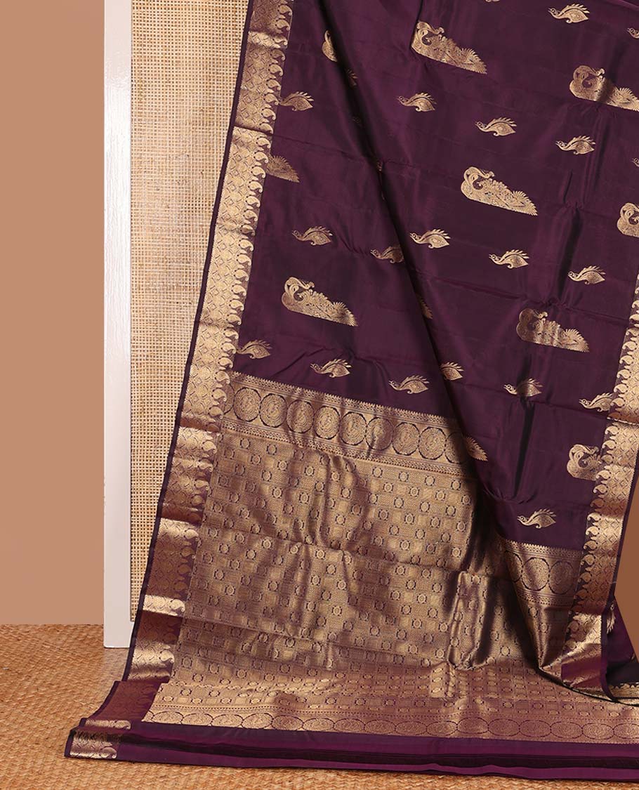 Purple mayil buttas Vasundhara silk mix saree, zari manga mokku border, and chakram buttas enclosed pallu