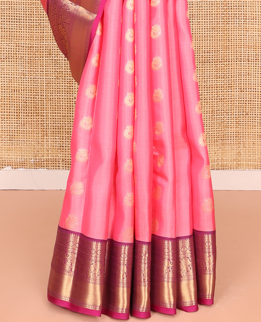 Pink Vasundhara Lite Silk Mix Saree, Mesmerized with Zari Buttas All Over Its Body, Complemented by Contrast Border of Rekku, Rudraksham, Laddu Kamalam, Yaanai, and Mayil Kann Designs, Grand Jaal Pallu and Paired with a Contrast Blouse
