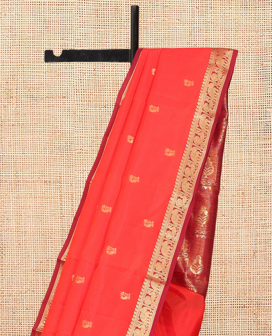 Orange Vasundhara Lite Silk Mix Saree, Gleamed Up with Zari Buttas, a Contrast Border of Manga, Kathir, Mayil, and Yaanai Designs, Grand Pallu, and a Contrast Blouse