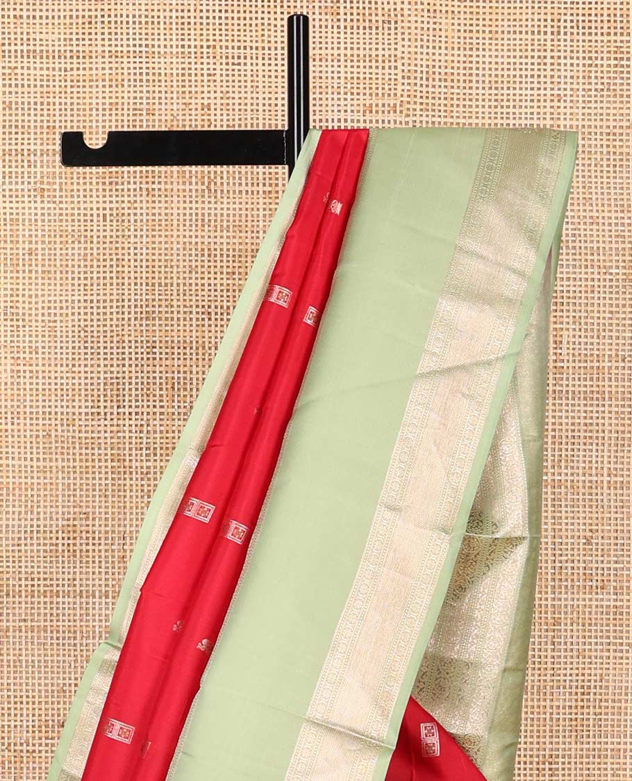 Red buttas silk saree with contrast korvai border of rekk, paun, muthu design & floral design pallu